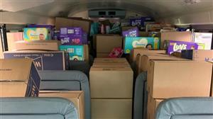 filled bus with supplies for families in need 